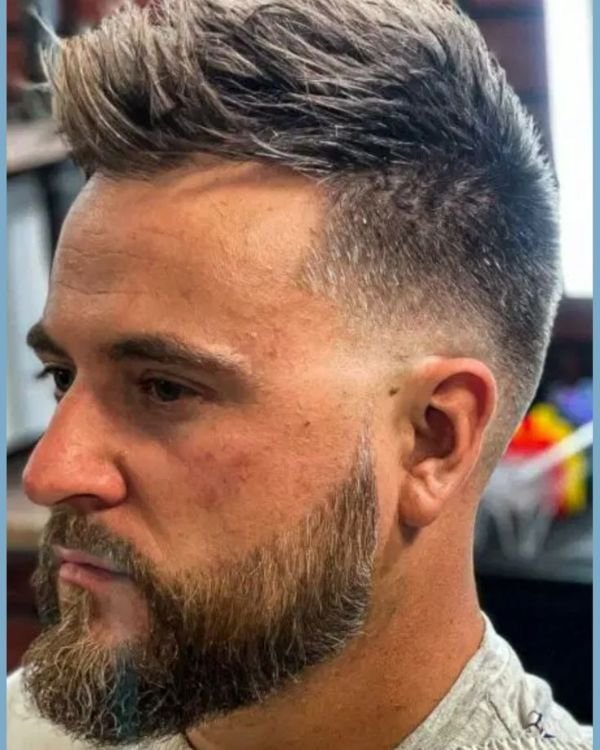 Edgy High Comb Over Fade with Hard Part