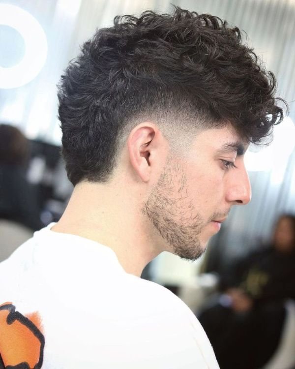 Messy Curly Mohawk with Taper Fade