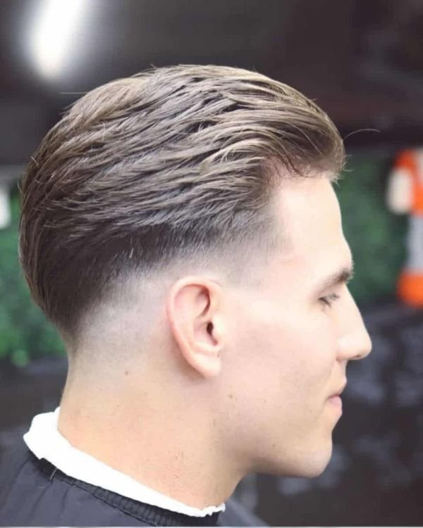 Slick Back with Mid Skin Fade